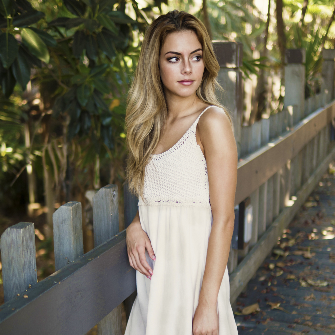 Modern Romance: Styling the Zoe Pleated Backless Midi Dress for Statement Evenings